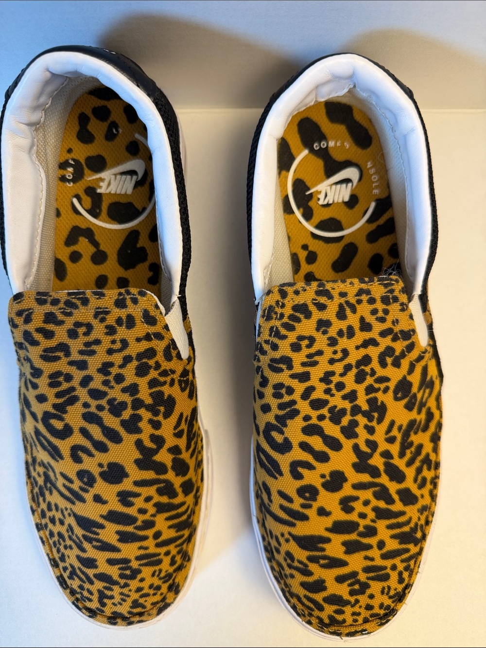 Nike  Slip-On Sneakers in Black and Yellow Leopard Print